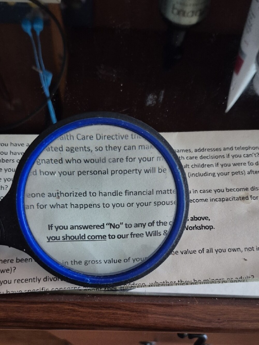 Handheld Magnifying Glass with Blue Accent